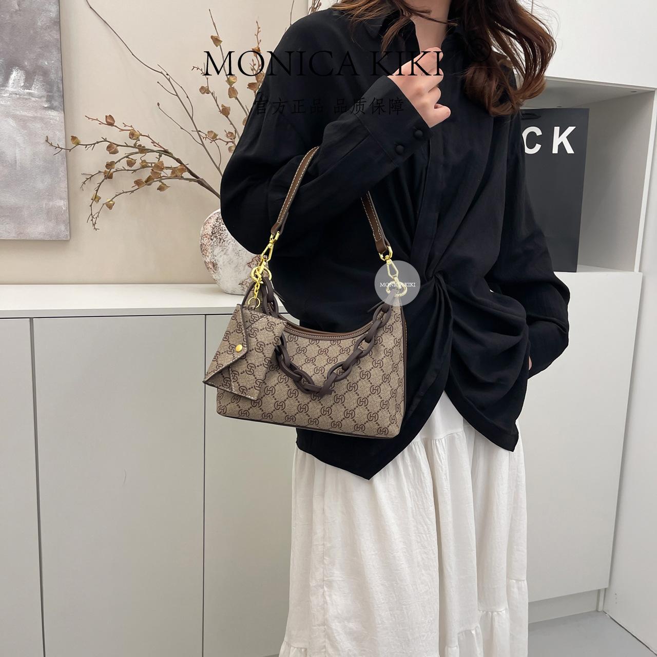 

Large-capacity crescent bag, new 2025 high-end foreign light luxury fashion trendy old flower single shoulder oblique span bag серый