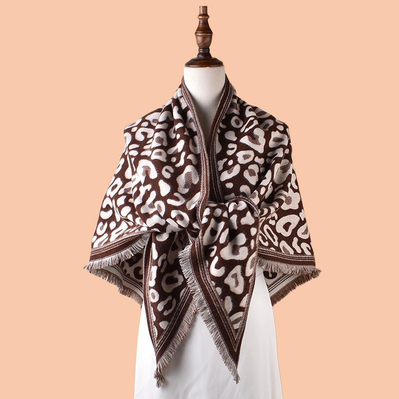 Autumn and winter new classic leopard print tassel imitation cashmere triangle scarf warm scarf shawl fashion spot wholesale