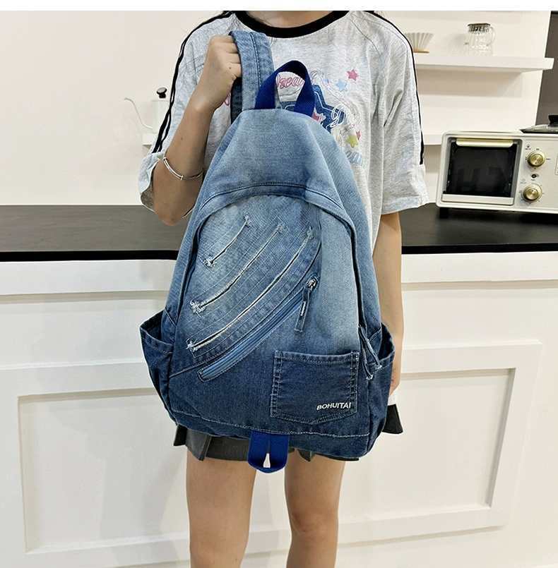

Hong Kong Style Gradient Denim Backpack Korean Commuter College Student Male Campus High School Schoolbag Female 30x13.5x44 синій
