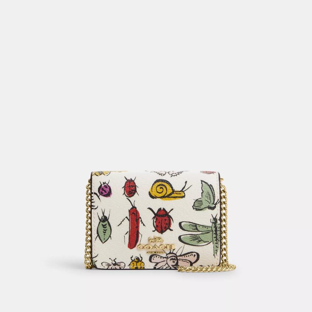 

Мини-кошелек Coach на цепочке с принтом Creature, золотистым мелом, разноцветный