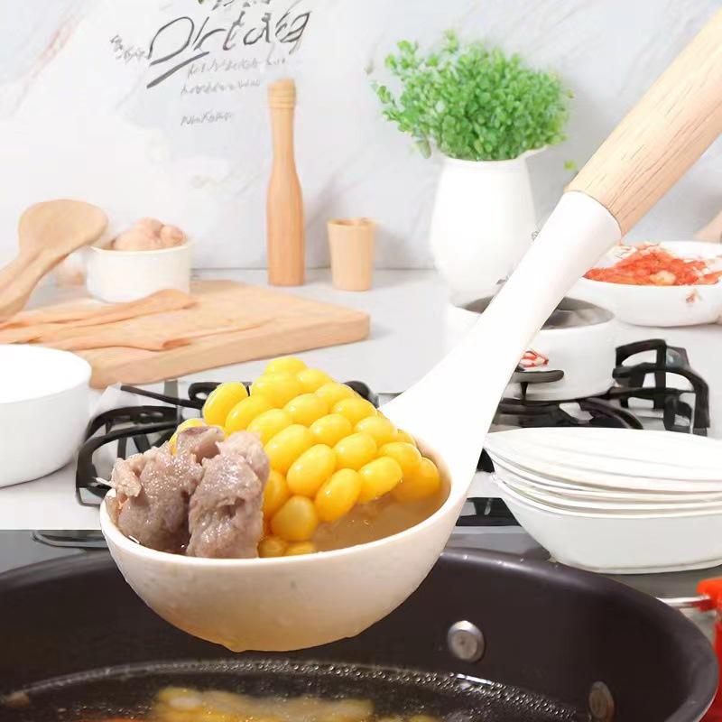 12-Piece Silicone Cookware Set with Wooden Handles - Non-stick, High-Temperature Resistant, Includes Spatula and Soup Ladle.