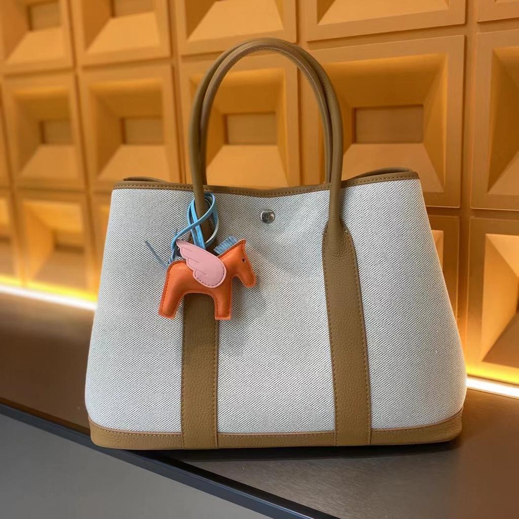Grensoverschrijdende nieuwe canvas tas met eerste laag koeienhuid voor dames, tuin handtas, echt leer, contrasterende kleur, schoudertas, messenger tas, tote bag