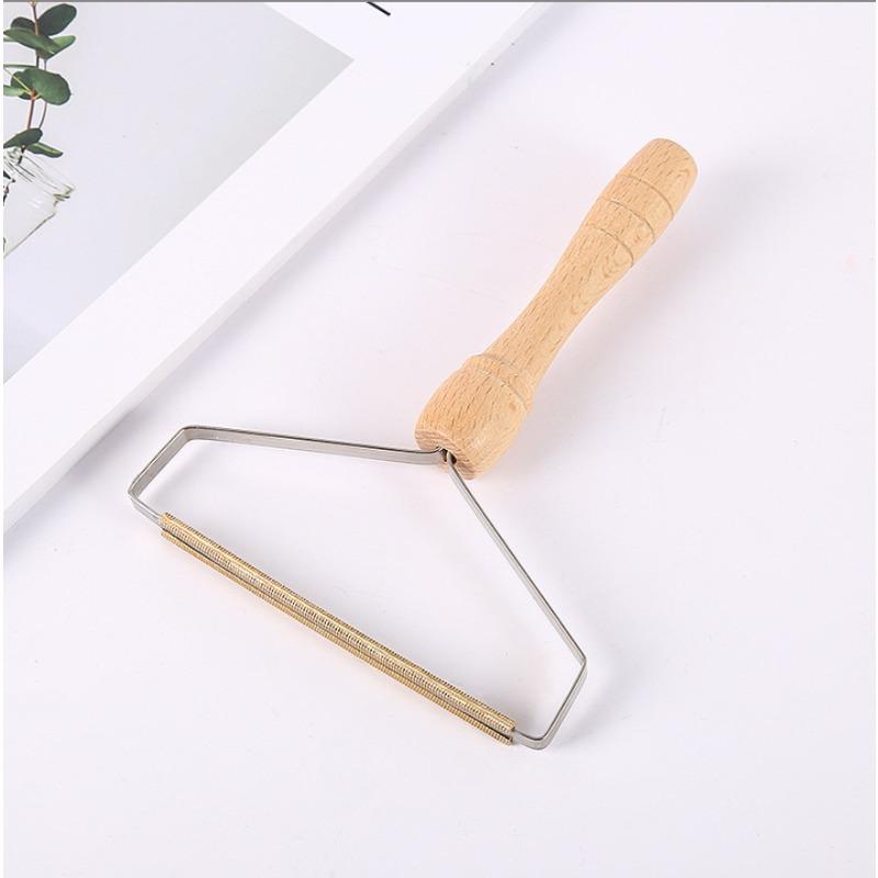 

Ручка из бука Нержавеющая сталь Не повреждает одежду Бритва Non-invasive scraper