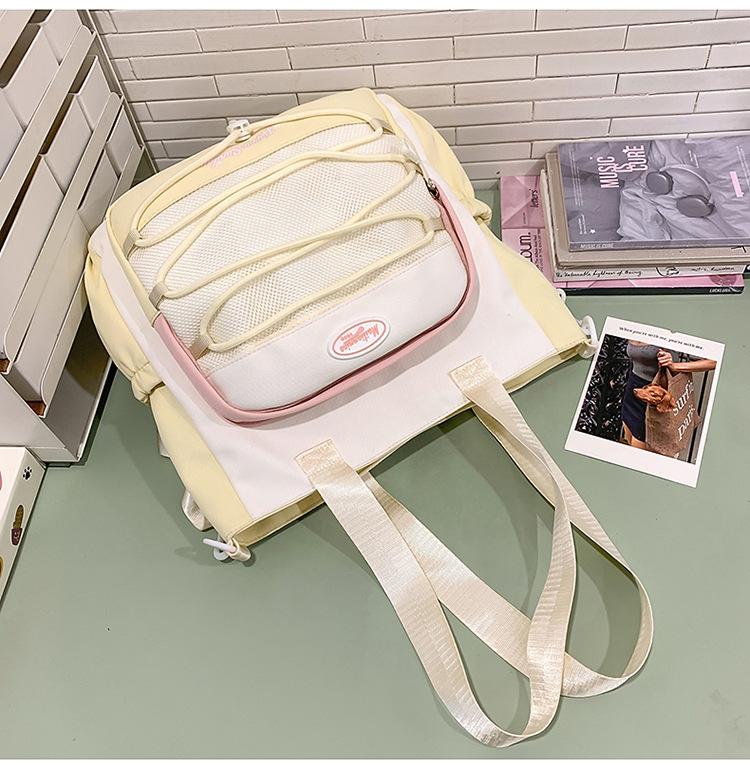 High-value cute primary school student spine care schoolbag female junior high school girl high school student backpack burden reduction