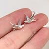 Temperament Tiere Vögel Clip-Ohrringe für Damen Charme Silberfarbe Edelstahl Schwalbe Fake Piercing Ohr-Manschetten Schmuck