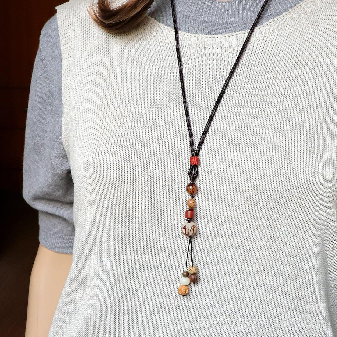 

Vintage Bodhi Seed Necklace: Retro Chinese Style Sweater Chain for Women - Ideal for Autumn/Winter Fashion.