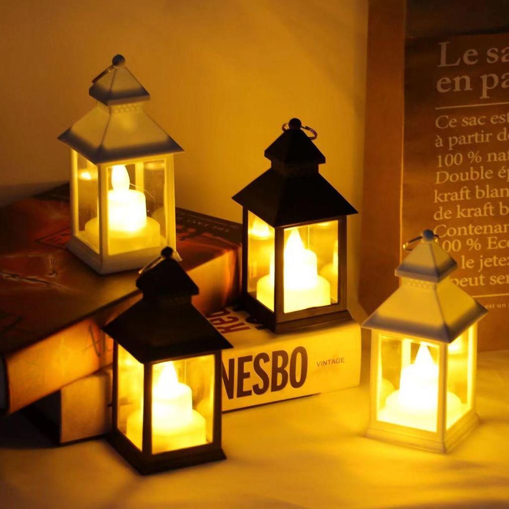 LED Courtyard Hanging Lanterns: Retro Indoor/Outdoor Atmosphere Lights with Electronic Candles for Camping and Table Decoration.