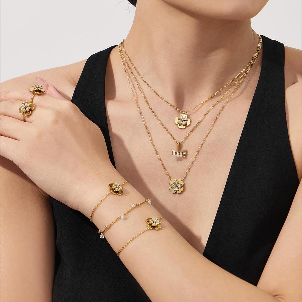 European & American Light Luxury Clover Jewelry Set: Stainless Steel, Zirconia-Embedded, Versatile Necklace, Bracelet, Ring & Earrings for Women.