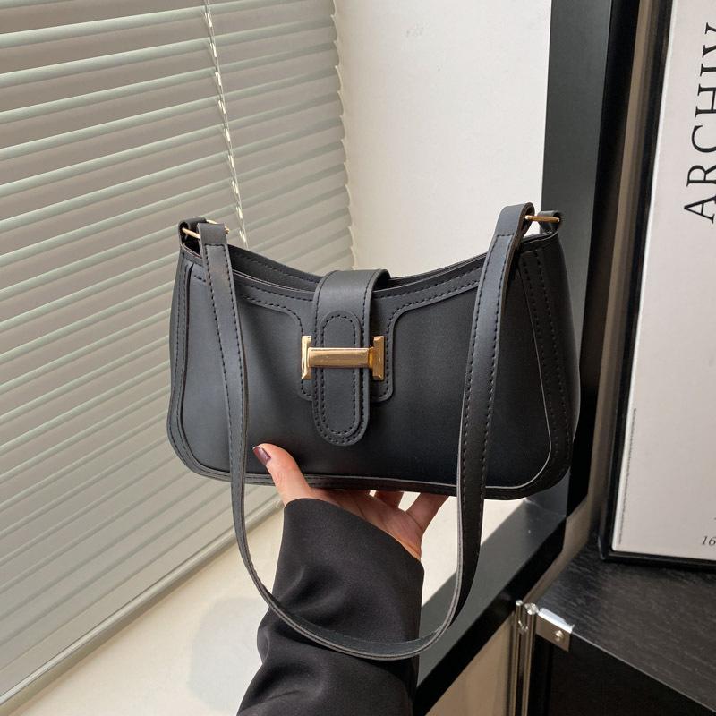 Frühling und Sommer neue vielseitige Temperament Damen einfarbig hochwertige Textur Pendeln Achseltasche Damen Handtrage tragbare Schultertasche