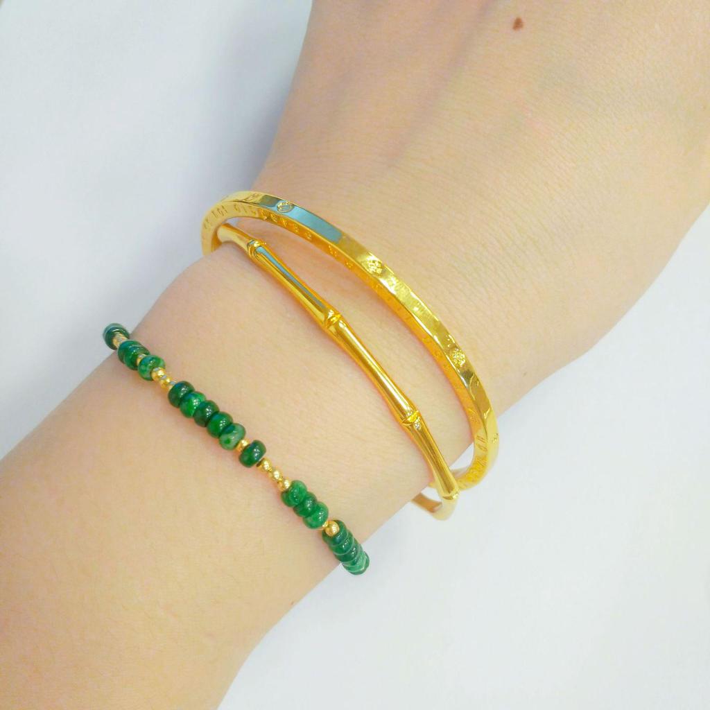 Golden Bamboo Double Ring Bangle: Chinese-Style Women's Hand Accessory.