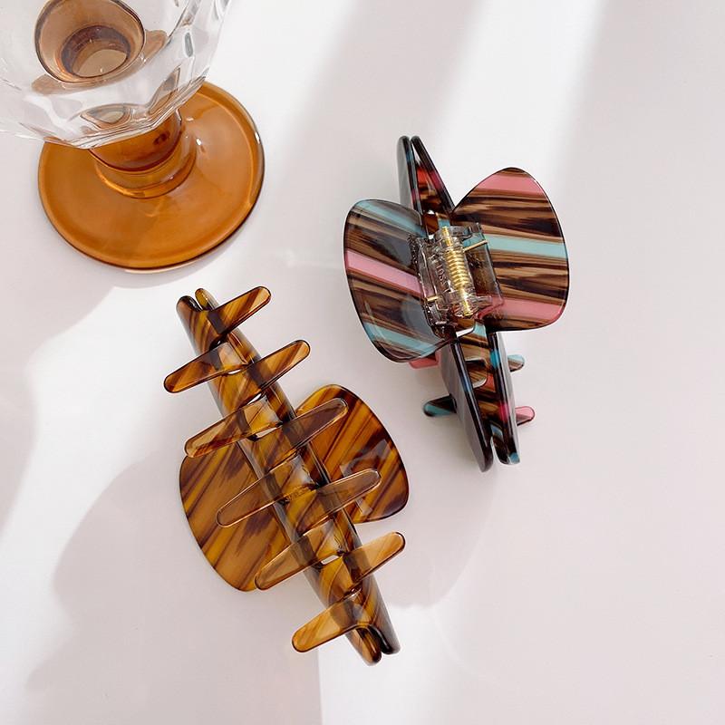 Stilvoller gestreifter Haarklammer-Clip aus Acetat für mühelose und schicke Frisuren für Frauen