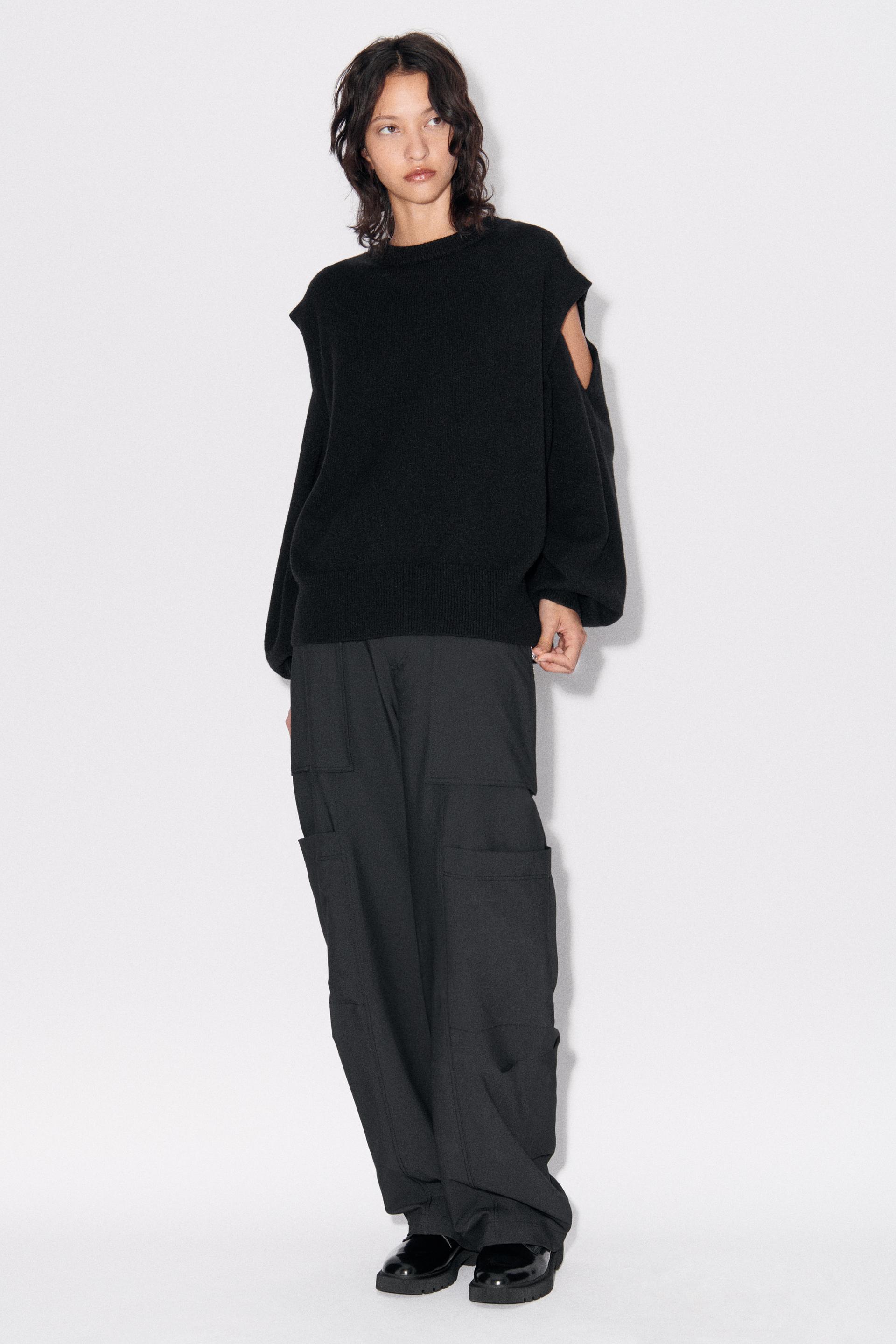 

ТРИКОТАЖНЫЙ СВИТЕР С ОТВЕРСТИЯМИ НА ПЛЕЧАХ