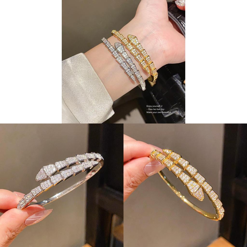 Bracciale di lusso a forma di serpente in rame placcato oro con accenti di zirconi per fashioniste