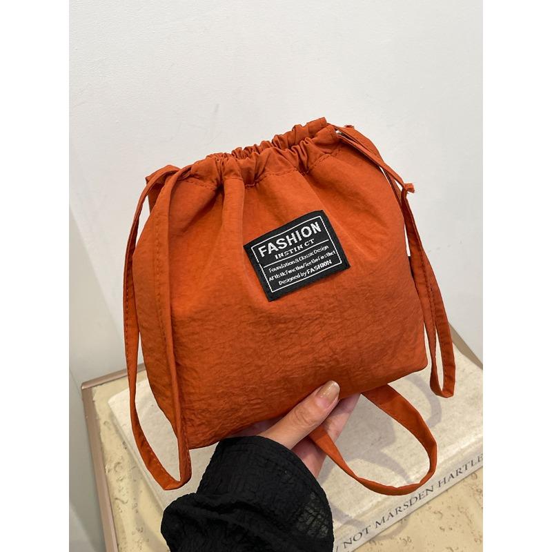 

Новая популярная сумка на плечо кроссбоди нейлоновая сумка контрастного цвета маленькая сумка на кулиске сумка-ведро женская сумка single package оранжевый