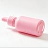 Sandblasted Pink Light-Blocking Glass Bottles: 20ml, 30ml, 50ml – Ideal for Cosmetics, Essential Oils, and Aromatherapy.