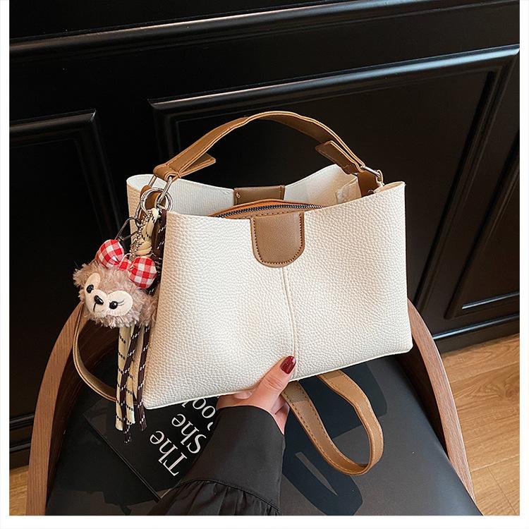 Solid Color Pendant 2025 Spring Retro New Simple Fashion Trend Temperament Casual Portable Shoulder Messenger Women's Bag