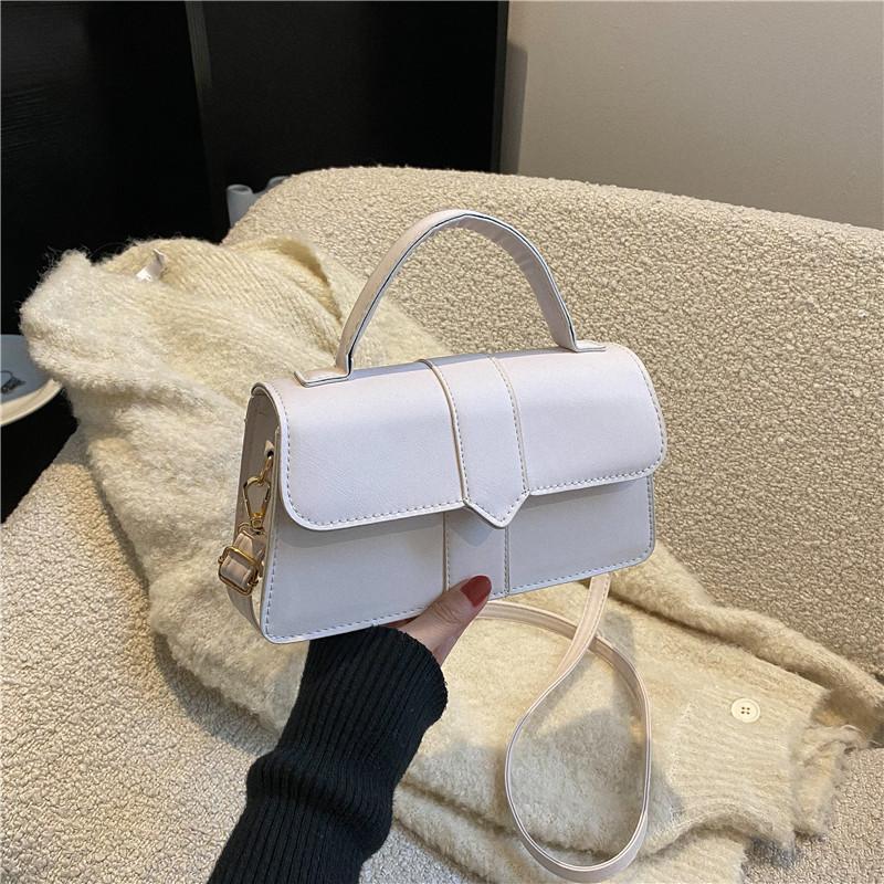 Einfarbige Handtasche mit schlichter Textur 2025 Mode Schulter-Umhängetasche kleine quadratische Tasche Tide Frühling und Sommer neue Modelle