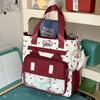 Schoolbag cute messenger bag women's new Japanese fresh, sweet and transparent pain bag students light class make-up bag
