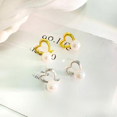 Süße Hollow Love Perlenohrringe für Damen mit leicht luxuriösem Temperament Exquisite Ohrringe