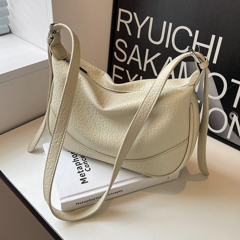 Chic Minimalist Soft Leather Lilac Texture Saddle Bag For Women In Elegant Colors