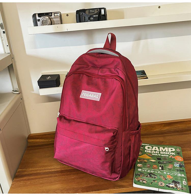 School Bag New Large Capacity Trend Versatile Junior High School Student School Bag Couple Fashion Embossing Simple Casual Lightweight Backpack