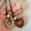 Fashion Resin Round Hollow Pendant Necklaces for Women Trendy Black Leather Rope Long Sweater Chain Necklaces Party Jewelry