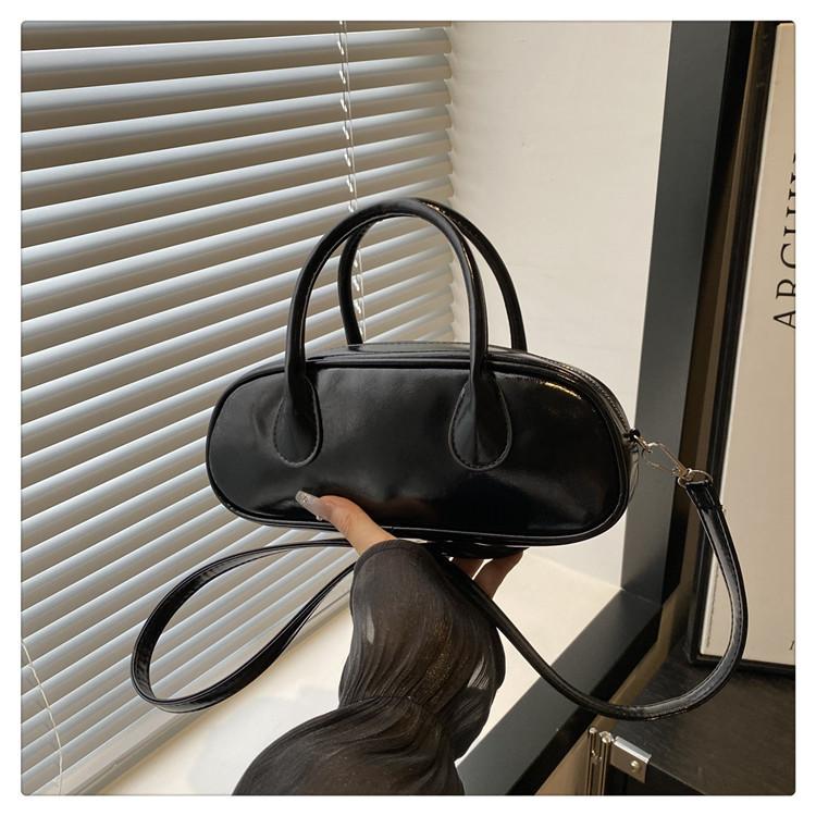 Niche simple solid color bowling bag retro pillow bag versatile commuter portable shoulder messenger bag чёрный