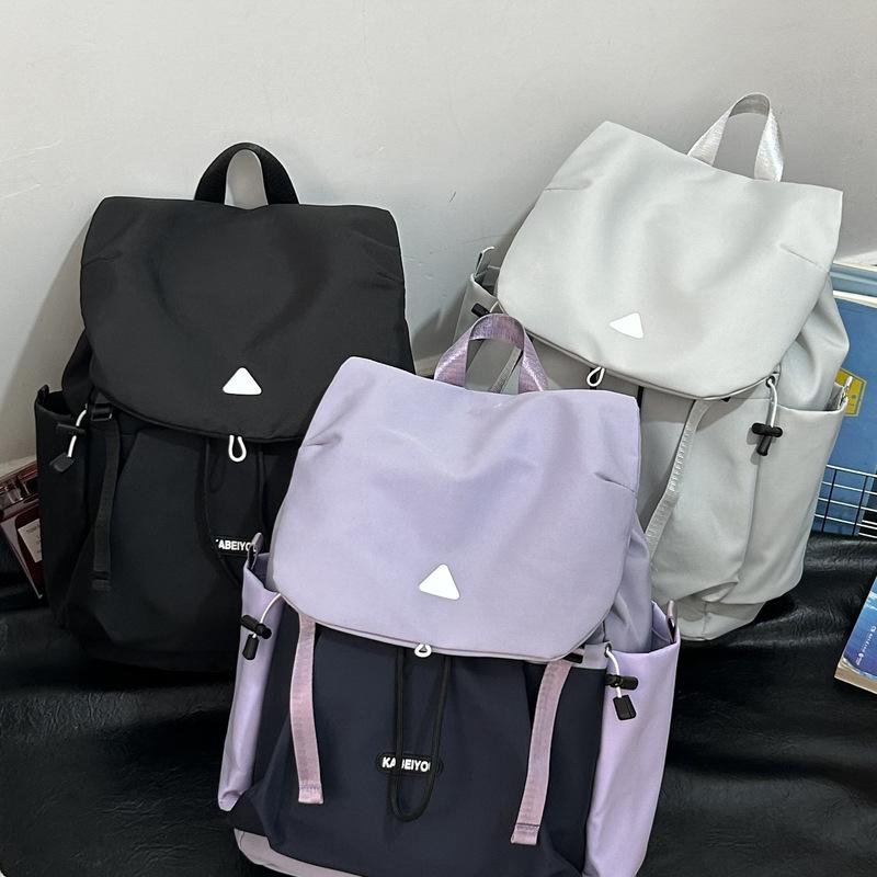 Fresh and sweet contrasting color girl bag, new light, high-value and large-capacity backpack for junior high school students