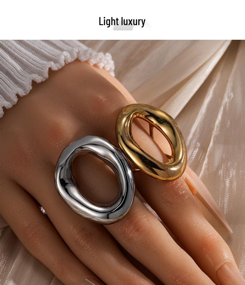 Luxury Geometric Stainless Steel Ring with Bold Lines and Irregular Hollow Design.