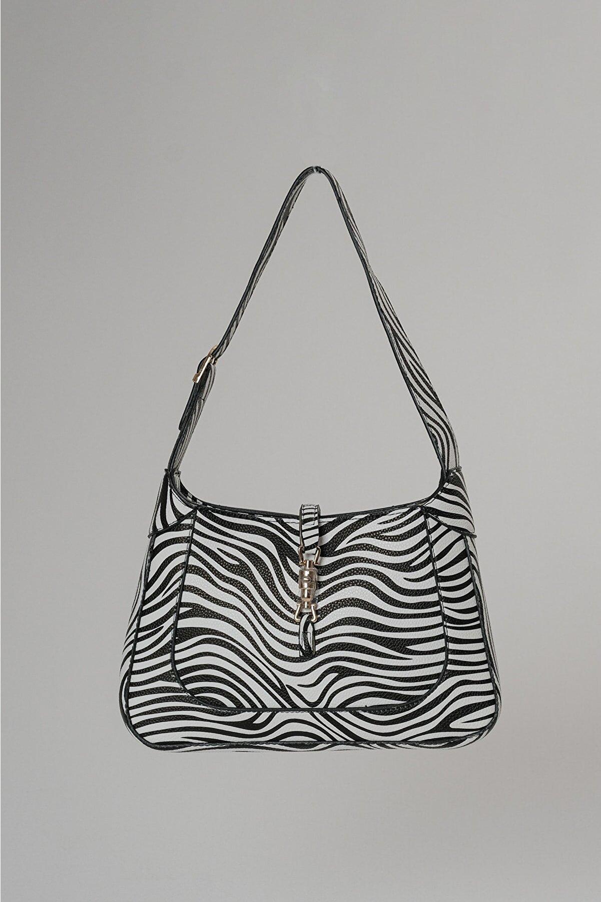 

Женская сумка-багет с замком Mng Zebra