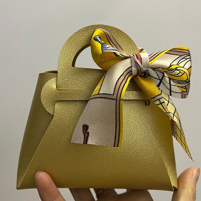 10 pezzi distribuiscono sacchetti regalo in pelle rosa, bomboniere per ospiti, mini borsetta con nastro, scatola per imballaggio di caramelle, decorazioni per feste