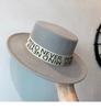 New Fedoras Women's Hat Flat Top Cap French Elegant Straw Hat Fedora Pearl Chain Hat Travel Beach Hat Panama Wide Brim Hat