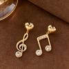 Coppia di Orecchini Pendenti Moda Tendenza Oro Asimmetrici Inlaid di Strass a Forma di Cuore Nota Musicale