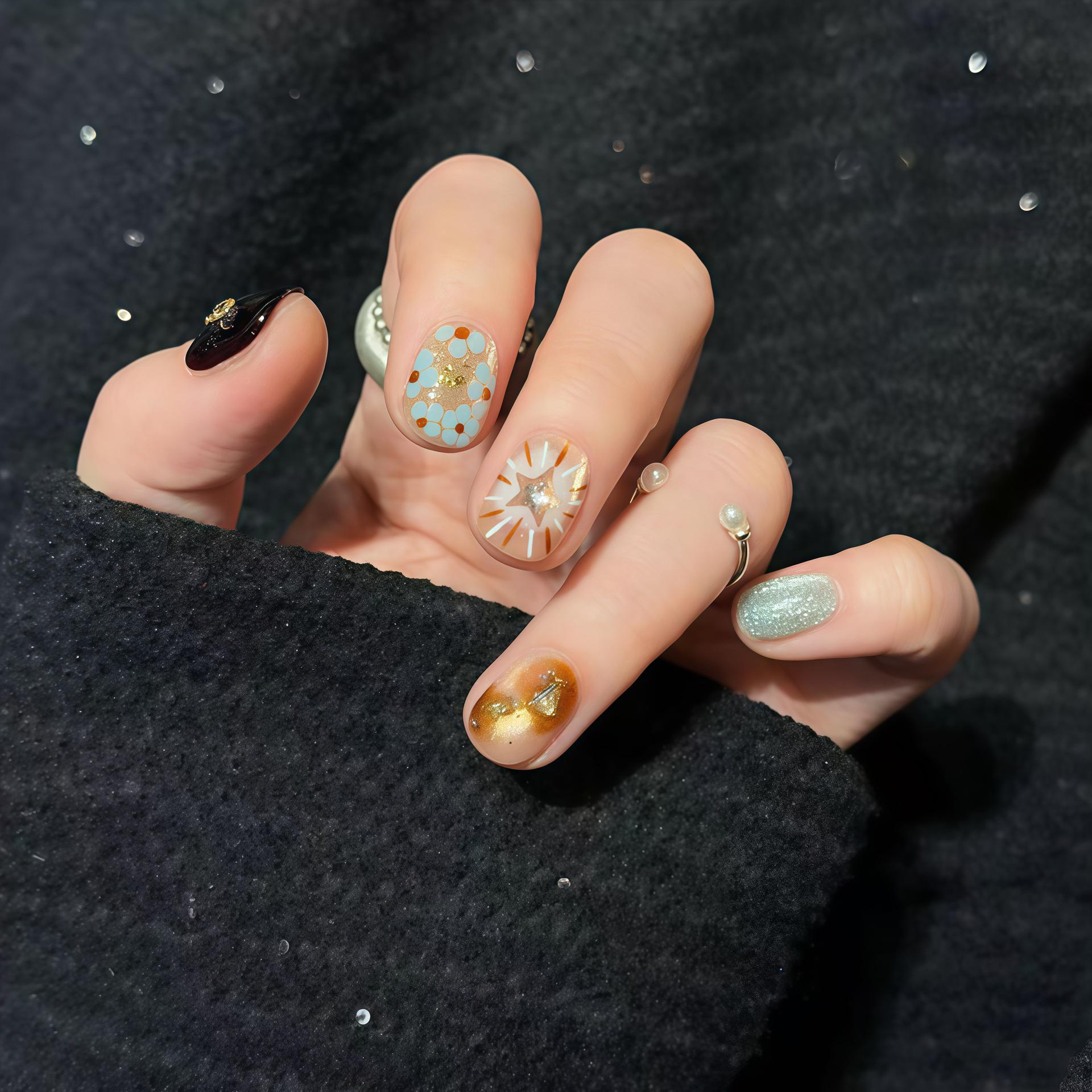 Wandering Iceland: Handmade Blue Crystal Cat Eye Nails with Gold Foil and Sparkling Firework Design XS