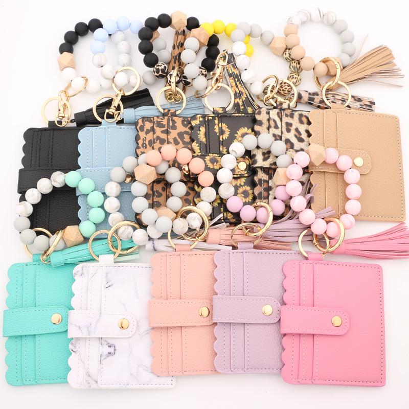 Leopard Print Silicone Bead Bracelet Wallet with PU Leather Tassel Keychain