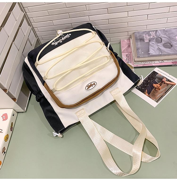 High-value cute primary school student spine care schoolbag female junior high school girl high school student backpack burden reduction