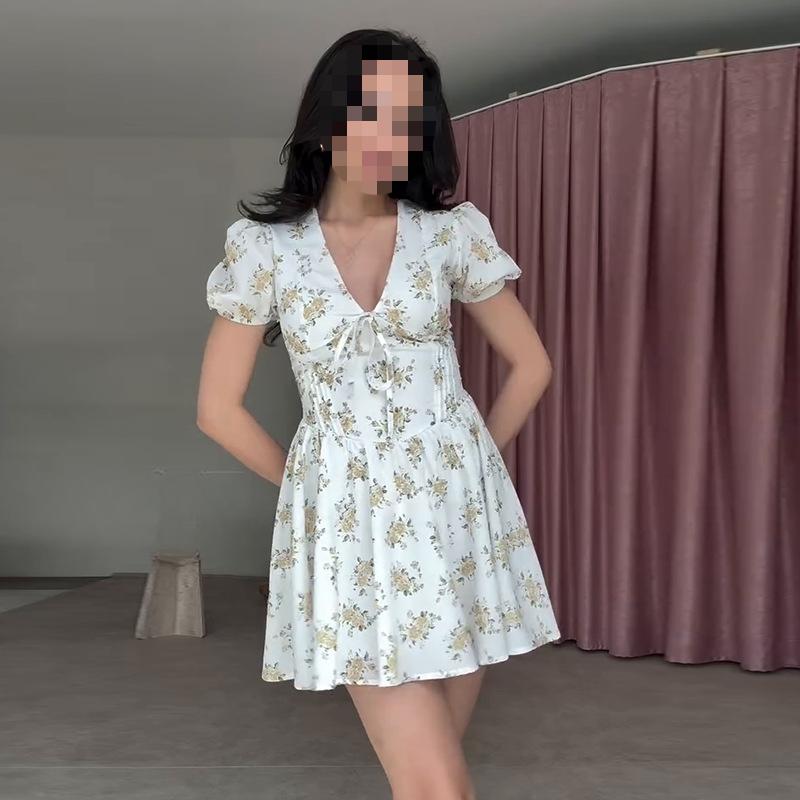 Evropské a americké dámské podzimní módní sexy květinové bublinkové rukávy s výstřihem do V, štíhlé retro šaty