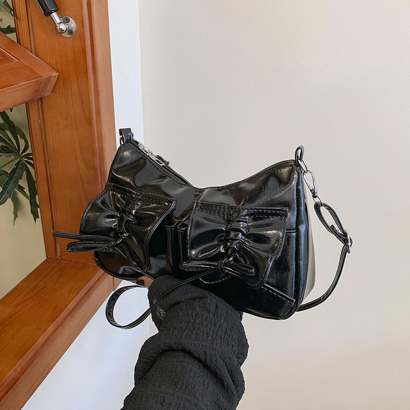 

Новый тренд бант темперамент премиум плечевая сумка женская простая мода зарубежная изысканная легкая роскошь сумка-мессенджер чёрный