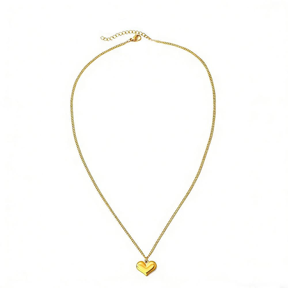 Gold Stainless Steel Cross Necklace - Light Luxury High-End Collarbone Chain with Gold Heart.