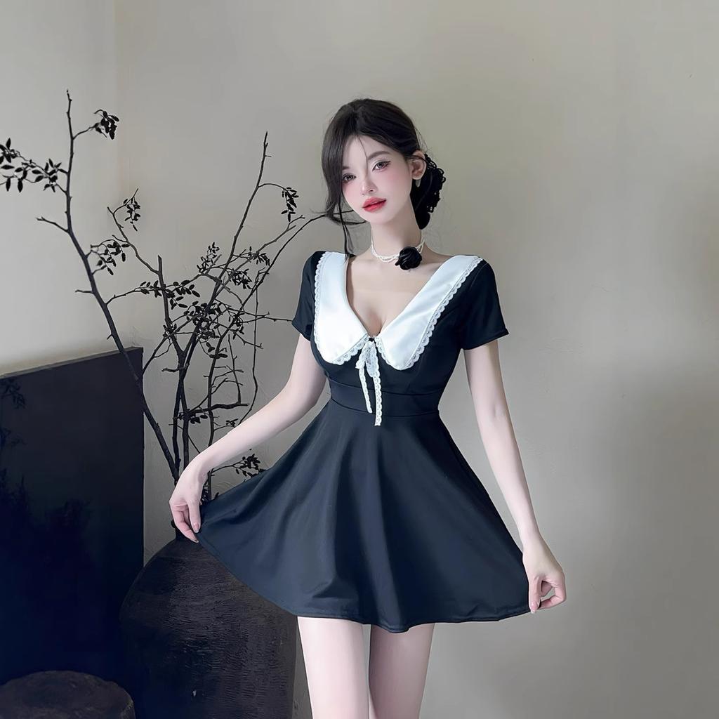 Sexy low-cut lapel dress, waist and thin, big swing a-word skirt, work clothes.