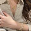 Gold-Plated Zircon Starburst Pendant Necklace - Elegant Fashion Jewelry for Women