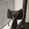 Solid color fashion bow new trendy texture commuting shoulder underarm baguette bag women