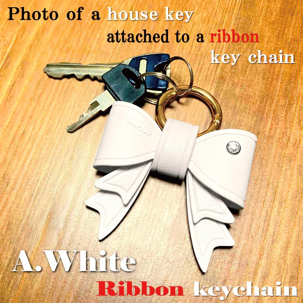 Cute, Korean-inspired, red leather keychain with ribbon, perfect as a bag charm. Perfect for matching keys. A perfect gift for girls and women.