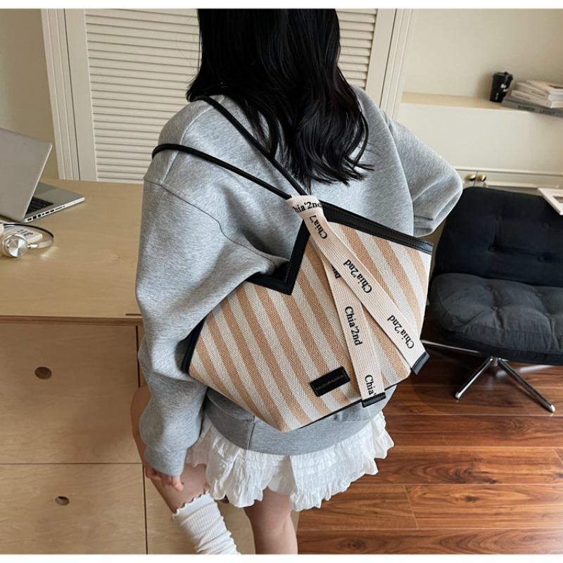 Striped canvas bag women's large-capacity new summer niche shoulder armpit bag college student class bag