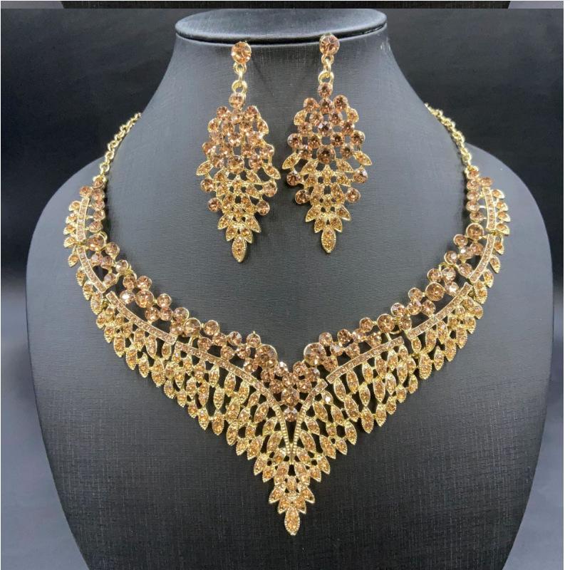 

2025 новый изысканный набор ожерелья и серег со стразами, аксессуары для свадебного платья для вечеринки, поставка бижутерии из сплава