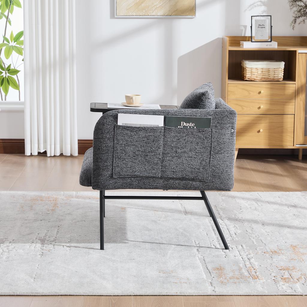 Modern single armchair with comfortable fabric backrest and two storage compartments, complemented by a practical side table.