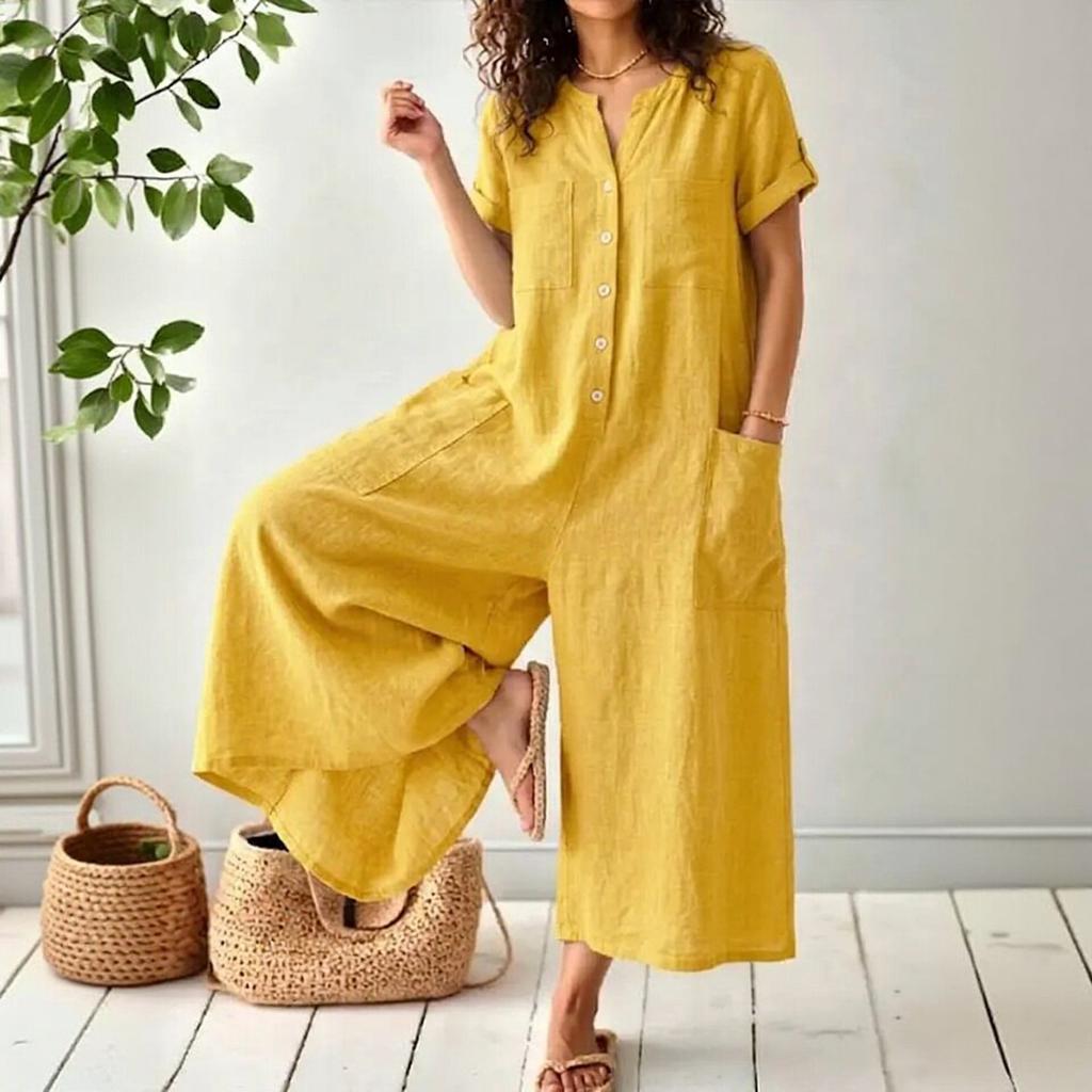 Tuta corta alla moda e casual da donna con bottoni, maniche corte e tasche