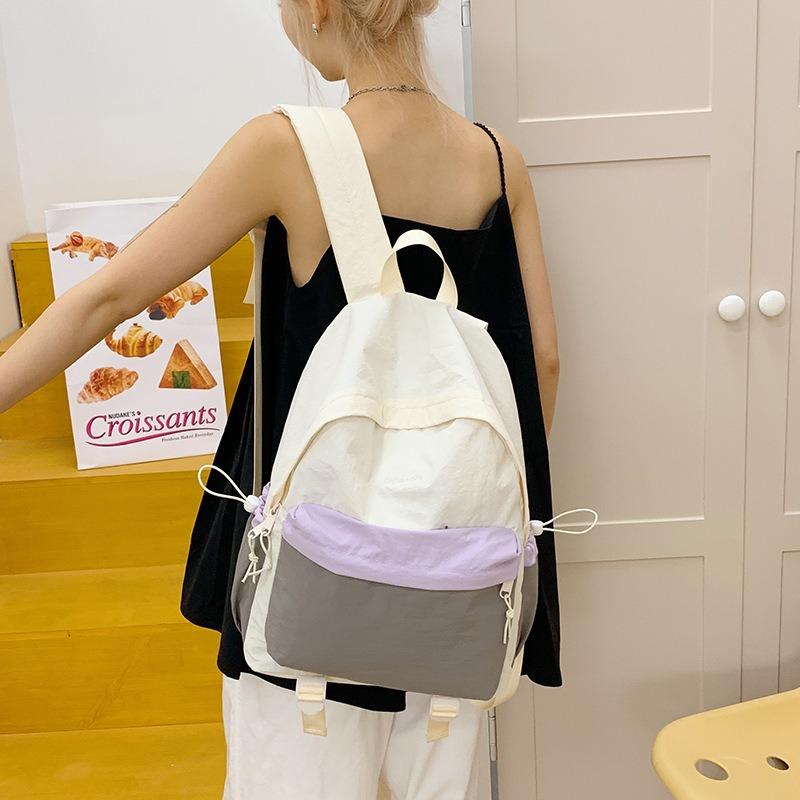 Outdoor lightweight backpack hiking waterproof mountaineering bag contrasting color college student schoolbag female computer bag tide