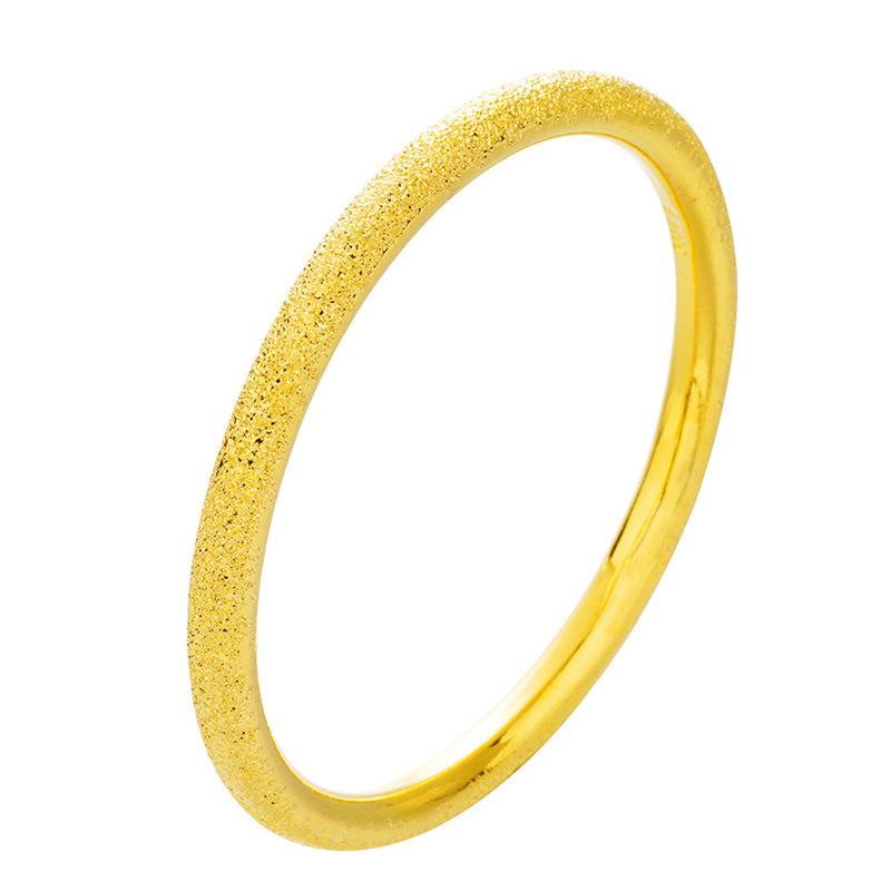 Anillo Pequeño Brillante: Elegante Banda Apilable Tono Dorado