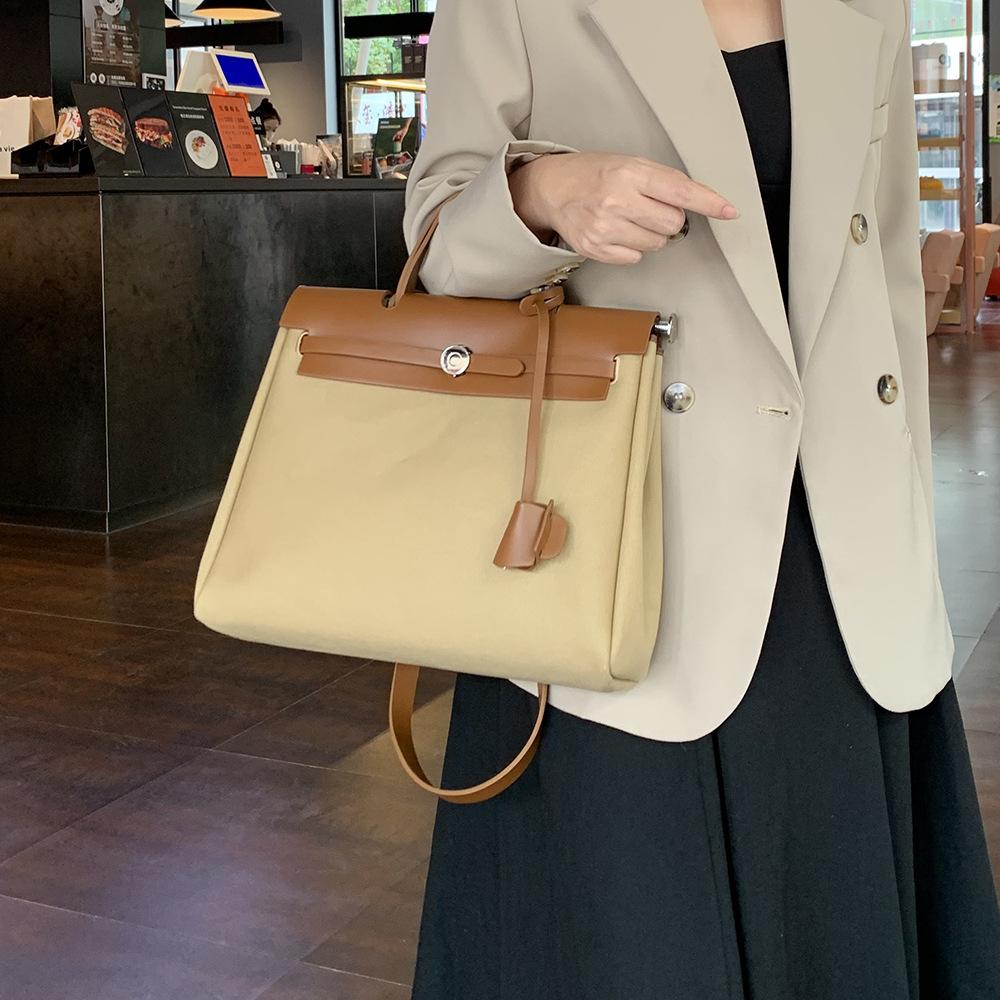 New Autumn and Winter Fashion Women's Handbag, Niche High-end Waterproof Canvas Crossbody Bag with Button Closure and Flap Design, Kelly Bag